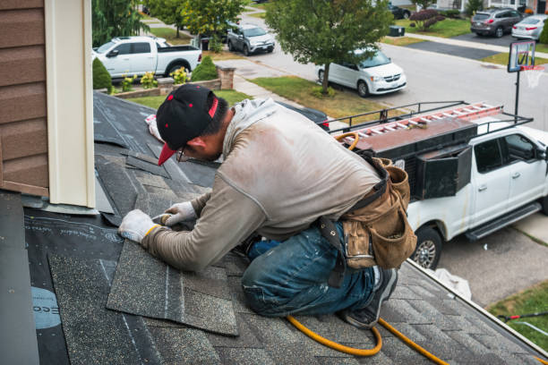 Professional Emergency Roof Repair technician working in Dunlo, PA